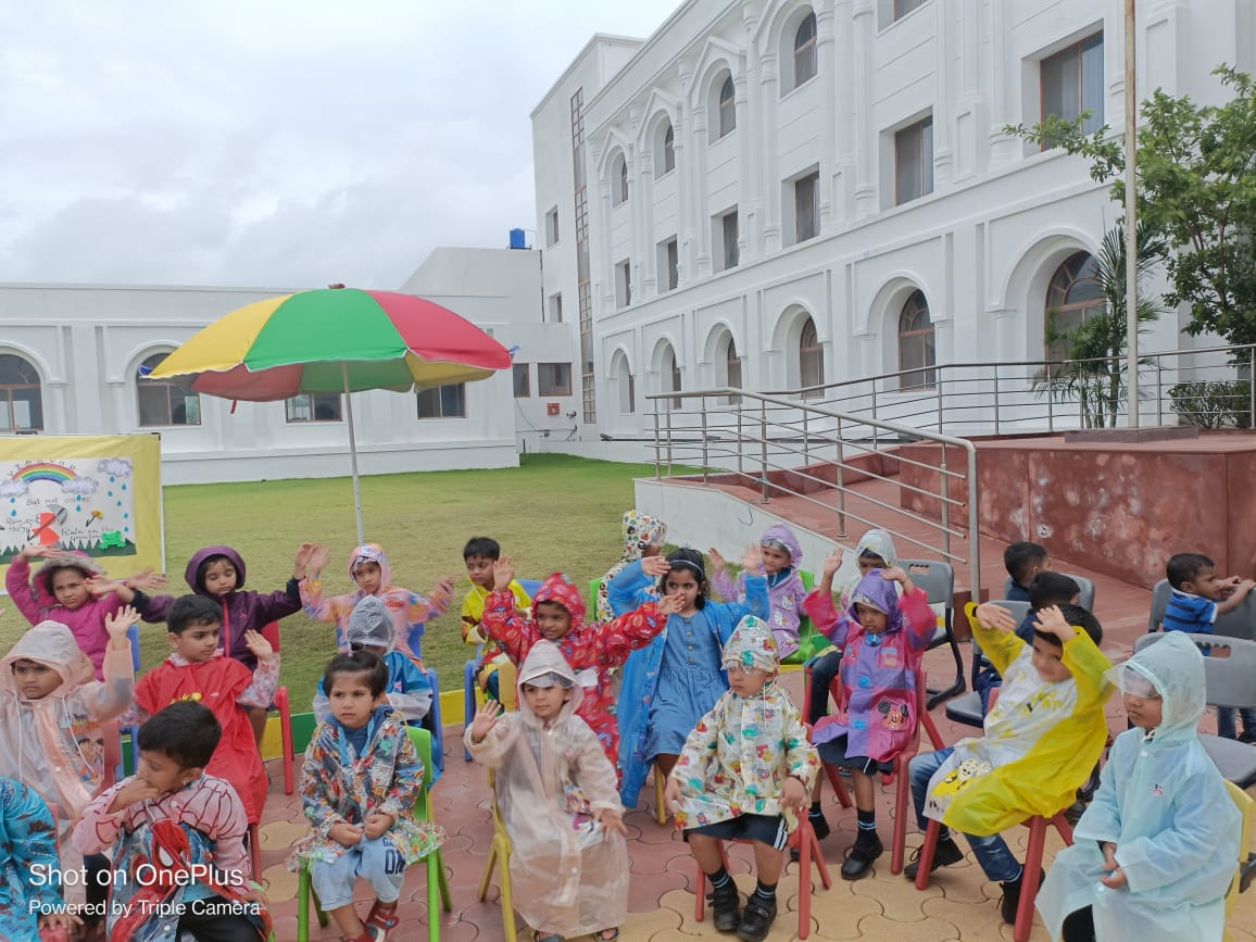 Pre Primary Students enjoying Monsoon day
